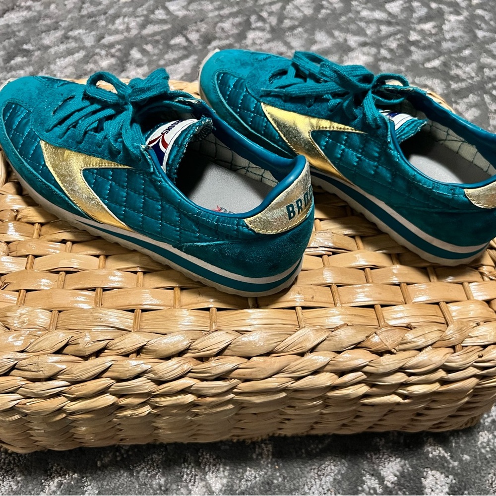 Brooks Blue and Gold Athletic Shoes with Retro Design